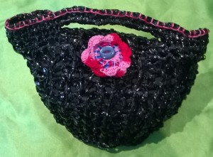 Another sparkly pinky flowery bag created using video tape (remember those?).  It will be for sale at Llanyrafon Manor Food & Craft Market, if not sold beforehand £7